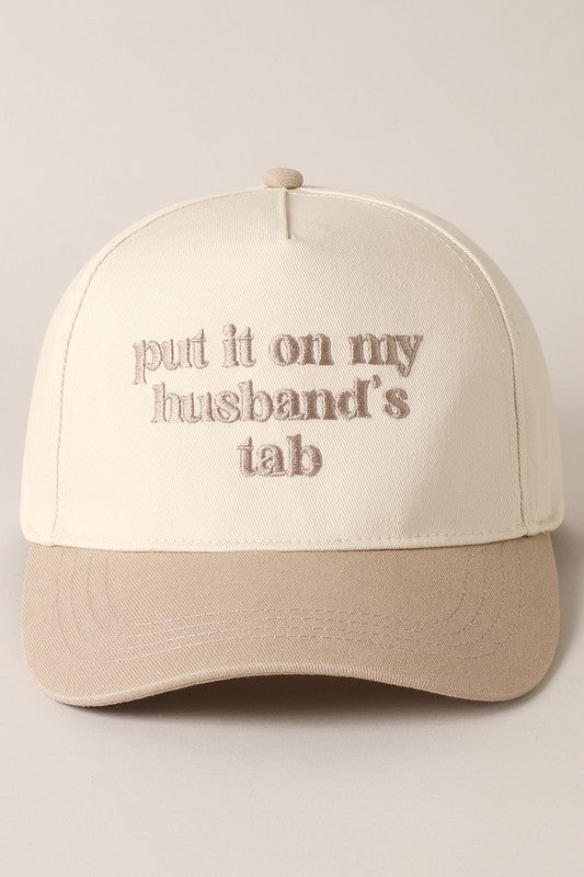 Put It On My Husband's Tab Embroidered Trucker Hat (beige)