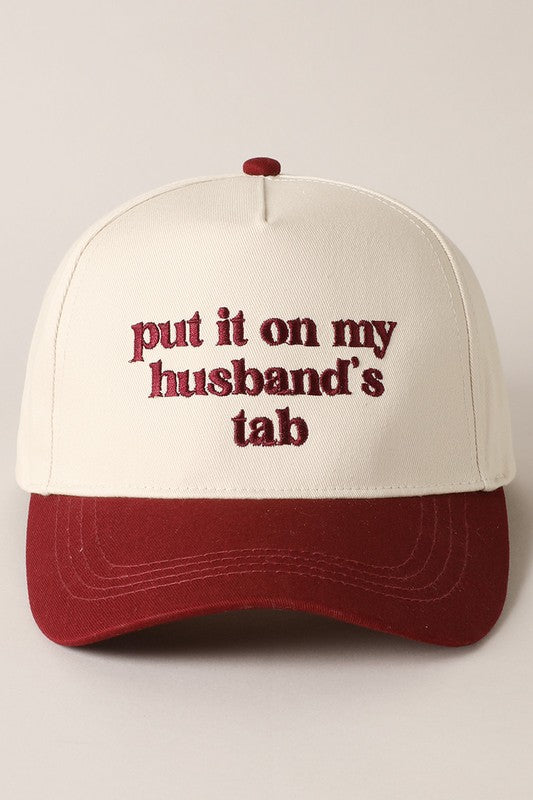 Put It On My Husband's Tab Embroidered Trucker Hat (burgundy)